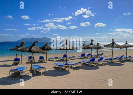 Empty loungers on the beach of Port de Pollenca, Majorca, Balearic Islands, Spain Stock Photo