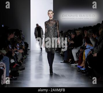 New York, NY, USA - February 9, 2020: A model walks runway for Dennis Basso Fall/Winter 2020 Collection during New York Fashion Week at Spring Studios Stock Photo