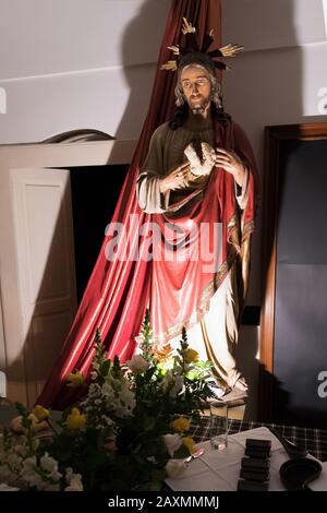 AVETRANA, ITALY - APRIL 19, 2019 - Exhibition of religious art during Holy Week. The statue of Christ during The Last Supper on Holy Thursday Stock Photo
