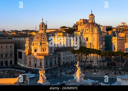 Piazza Venezia central hub of Rome where several thoroughfares intersect, including the Via dei Fori Imperiali and the Via del Corso. Italy. Stock Photo