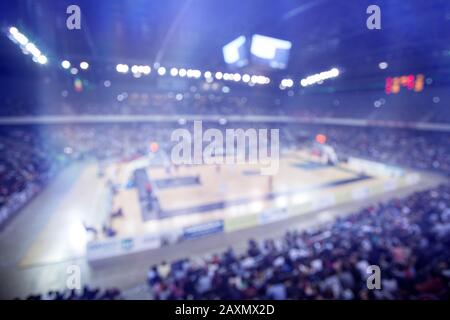 Blurred sports arena and fans during a basketball game Stock Photo