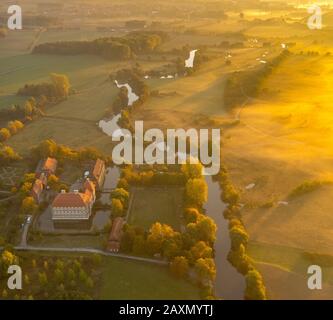 Aerial shots, castle Oberwerries in the morning light, Lippe meadows, river Lippe, Lippe meadows, golden Octobers over Hamm, Hamm, Ruhr area, North Rh Stock Photo