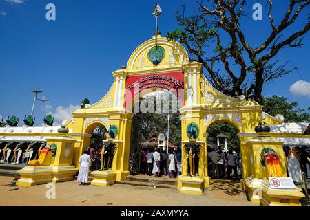 Kataragama, Sri Lanka - January 2020: Pilgrims in the Maha Devale Hindu sanctuary on January 19, 2020 in Kataragama, Sri Lanka. Stock Photo