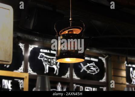 black old kettle in the air, black image , inside Stock Photo