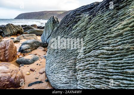 Kinnagoe bay in County Donegal, Inishowen has an extraordinary selection of colourful stones- Ireland. Stock Photo