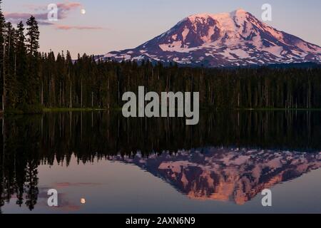 Image of Mt Adams and its reflection in Takhlakh Lake near sunset with ...