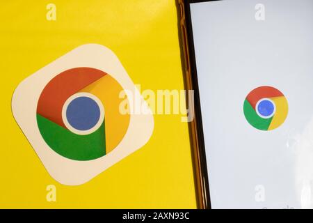 Los Angeles, California, USA - 12 February 2020: Google Chrome app logo and phone with icon close up , Illustrative Editorial Stock Photo