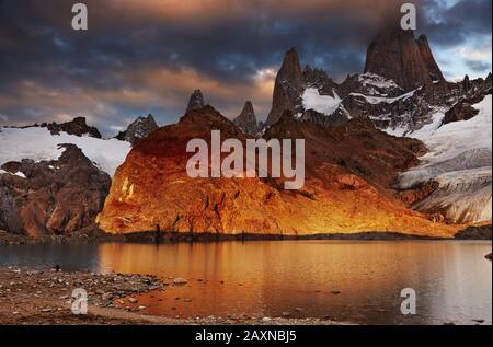 Laguna de Los Tres and mount Fitz Roy, Dramatical sunrise, Patagonia, Argentina Stock Photo