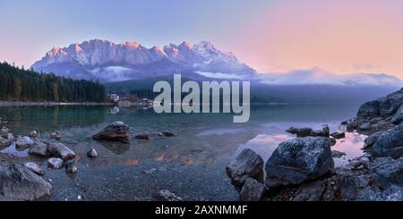 Evening mood in the Eibsee in front of Wetterstein Range Stock Photo