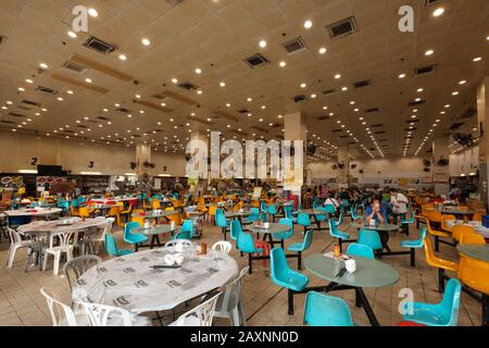 Hong Kong - November, 2019: Empty tables in food court / Cooked Food Centre in Sham Shui Po, Hong Kong Stock Photo