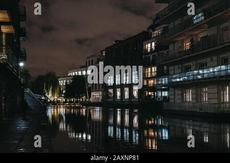 London, UK - November 26, 2019: Modern blocks of flats along Regents Canal near Camden Market, London, in the evening. In 2020 the Regents Canal marks Stock Photo