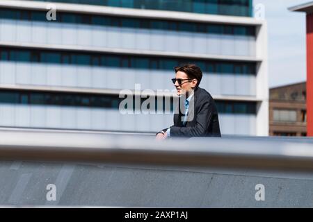 Young businessman outside, Frankfurt on the Main, Hessen, Germany Stock Photo