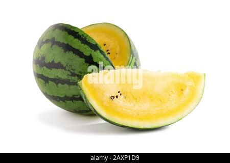 Sliced yellow watermelon isolated on a white background. Saved paths for cutting with and without shadow. Stock Photo