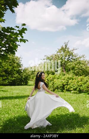 Beautiful Enigmatic Woman Standing in Glasshouse. Caucasian Girl with Short  Brown Hair in Modest Dress Holding Flower Pot. Tenderness Elegant Female  Model Eco Photoshoot in Indoor Garden Stock Photo | Adobe Stock