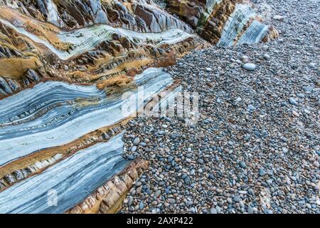 Pebbles and rock structure to Costa Verde, Spain, Playa del Silencio, Asturias, North Spain, Stock Photo