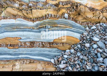 Pebbles and rock structure to Costa Verde, Spain, Playa del Silencio, Asturias, North Spain, Stock Photo