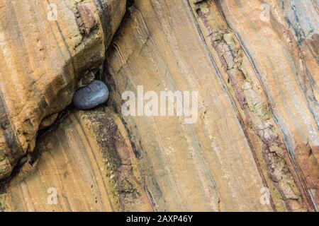 Pebbles and rock structure to Costa Verde, Spain, Playa del Silencio, Asturias, North Spain, Stock Photo