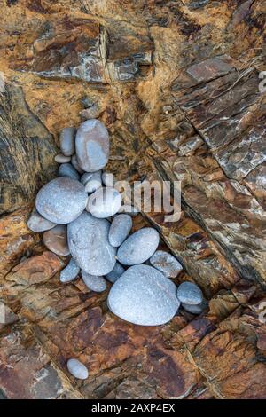 Pebbles and rock structure to Costa Verde, Spain, Playa del Silencio, Asturias, North Spain, Stock Photo