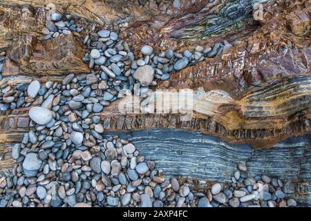 Pebbles and rock structure to Costa Verde, Spain, Playa del Silencio, Asturias, North Spain, Stock Photo