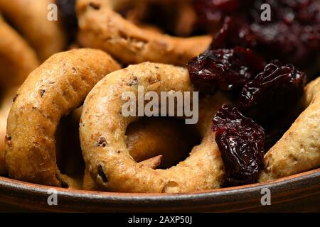 food as a background - whole grain wheat bagels with dried fruits Stock Photo