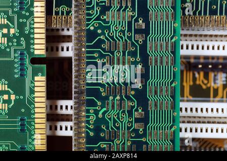 Computer motherboard and RAM memory modules. Composition with electronic components. Stock Photo