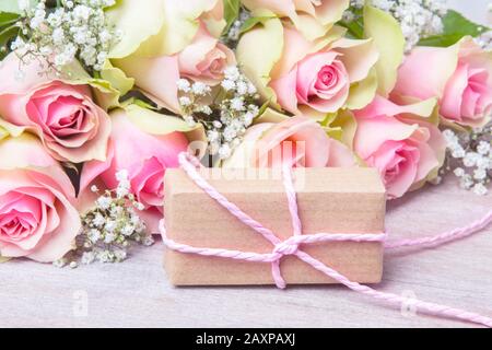 pink roses and gift Stock Photo