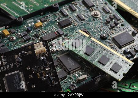 RAM memories, hard drives, expansion cards. Used consumer electronics components. Stock Photo