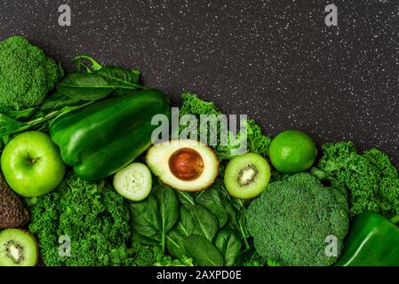 Selection of healthy green food fresh vegetables and fruit. Stock Photo