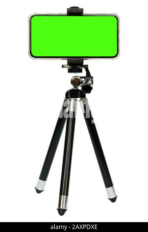 Smart phone of green screen on tripod isolated on white background with clipping path Stock Photo