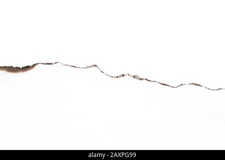 Paper burned old grunge on white background with clipping path Stock Photo