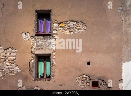 Old house wall and windows in Narbonne old town. Stock Photo