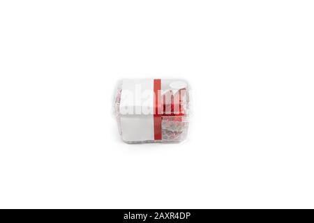Fresh Asia Strawberry are arranged in premium packaging plastic box with bubble wrap inside on the white background. Clipping path. Stock Photo