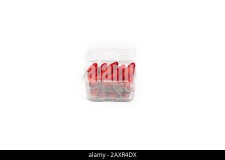 Fresh Asia Strawberry are arranged in premium packaging plastic box with bubble wrap inside on the white background. Clipping path. Stock Photo