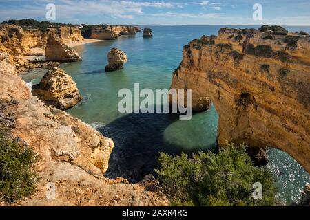 Rocky coast at Praia da Marinha near Benagil, Algarve, Faro district, Portugal Stock Photo