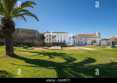 City wall and St. Mary's Church Igreja de Santa Maria, Lagos, Algarve, Faro district, Portugal Stock Photo