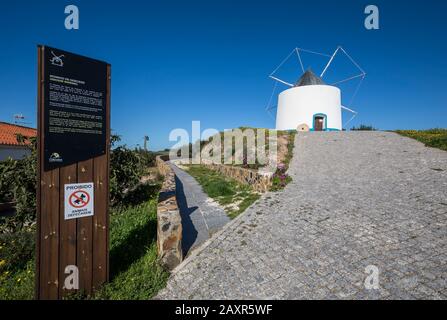 Windmill with information board, Odeceixe, Costa Vicentina, Algarve, Faro district, Portugal Stock Photo