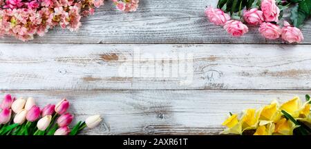 Corner borders of a variety of artificial flowers for springtime or love concepts Stock Photo