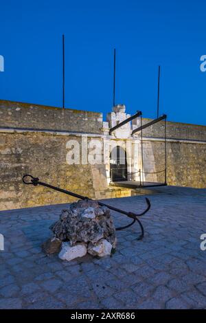 Fort Forte da Ponta da Bandeira in the evening, Lagos, Algarve, Faro district, Portugal Stock Photo