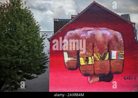 Graffiti on house wall, fist, Love, Liege, Walloon Region, Belgium Stock Photo