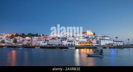 Ferragudo fishing village in the evening, Algarve, Faro district, Portugal Stock Photo