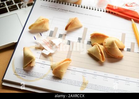 Fortune cookies on a financial chart. Concept of decision making. Horizontal Stock Photo
