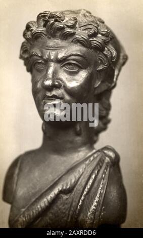 1930 ca , LAGO DI NEMI , Lazio , ITALY : The archeological interest site with discovery of ancient remains of the hull of one of the two roman ship by roman Emperor Caligula in the 1st century AD . Ornamental bronze Herm with human head of Divinity belonged to the Roman ship recovered , photo by Guido Bernardi , Genzano di Roma . Recovered from the lake bed in 1929 - 1932 , the ships were destroyed by Several shells of the United States Army hit the Museum around 8 pm, causing little damage but was the German Nazi to burn the Museum with fire during World War II in 1944 , the day 31 may . - bo Stock Photo