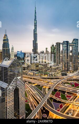 A shot of Dubai city showing Sheikh Zayed Road intersection and Burj Khalifa Stock Photo