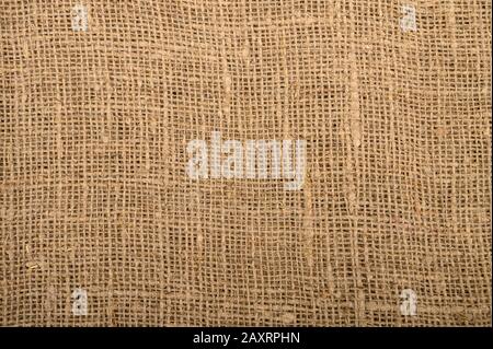 Texture of coarse homespun fabric. Background image, Close-up Stock Photo