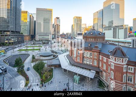 Sunset at Tokyo city with view of Tokyo train station in Japan. Stock Photo