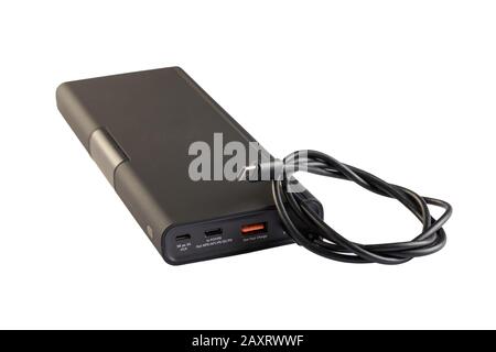 Power bank with usb cable. External battery for recharging isolated on white background. Stock Photo