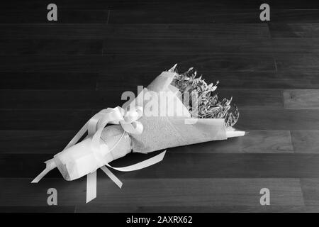 Withered roses on wood floor Stock Photo