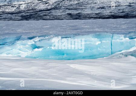 Sweden, Lapland, Abisko, frozen lake (Torneträsk), blocks of ice with crack Stock Photo