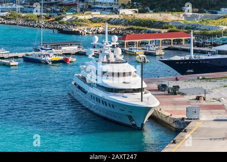 Philipsburg, St. Maarten - December 17, 2018: Private white luxury motor yacht Axioma moored in Caribbean island of Sint Maarten - Saint Martin. Stock Photo