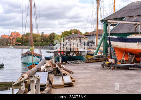 View of the traditional Underfall shipyard and The Cottage Inn in Bristol Docks, UK Stock Photo